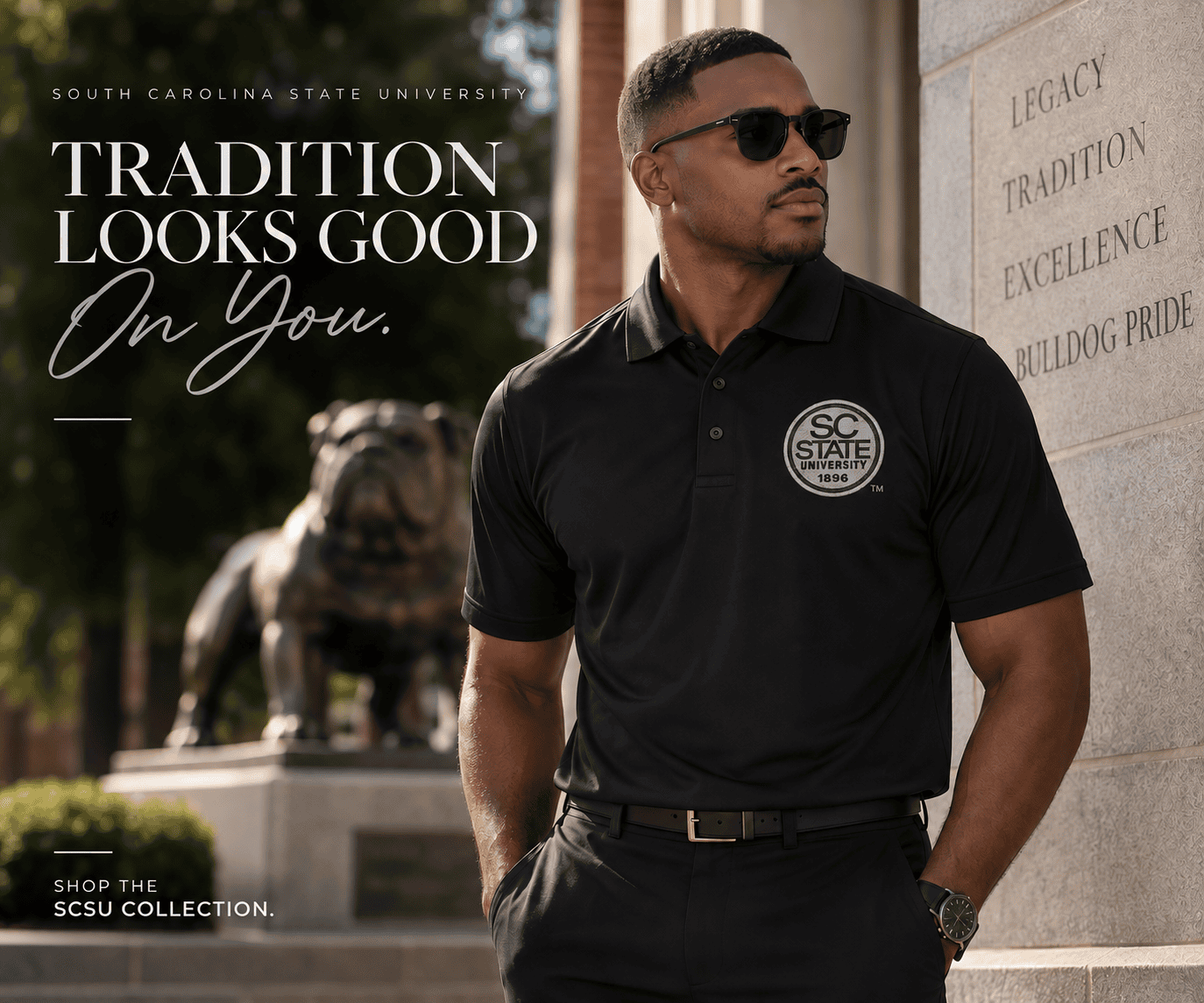 Man wearing SC State polo by bulldog statue